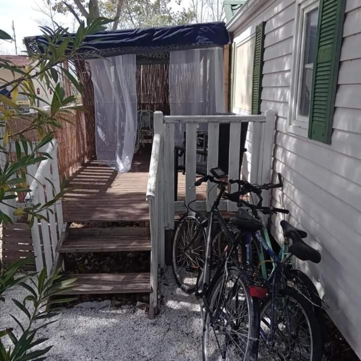 a couple of bikes parked next to a house at Ti case in Le Grau-du-Roi