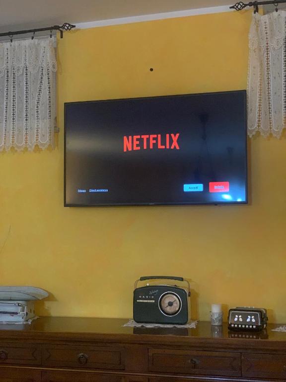 TV a/nebo společenská místnost v ubytování Taverna relais