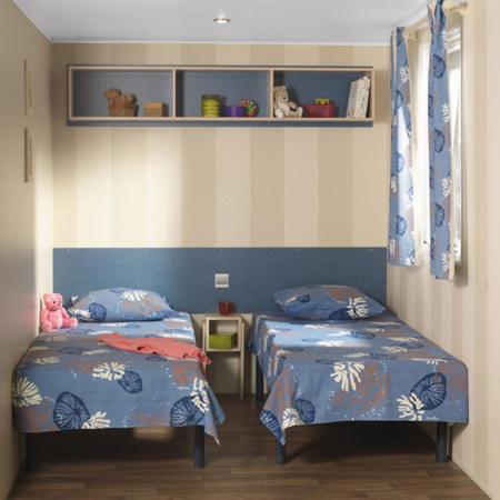 Letto o letti in una camera di Camping Familial - Parc Aquatique - Grande Aire de Jeux à la Montagne