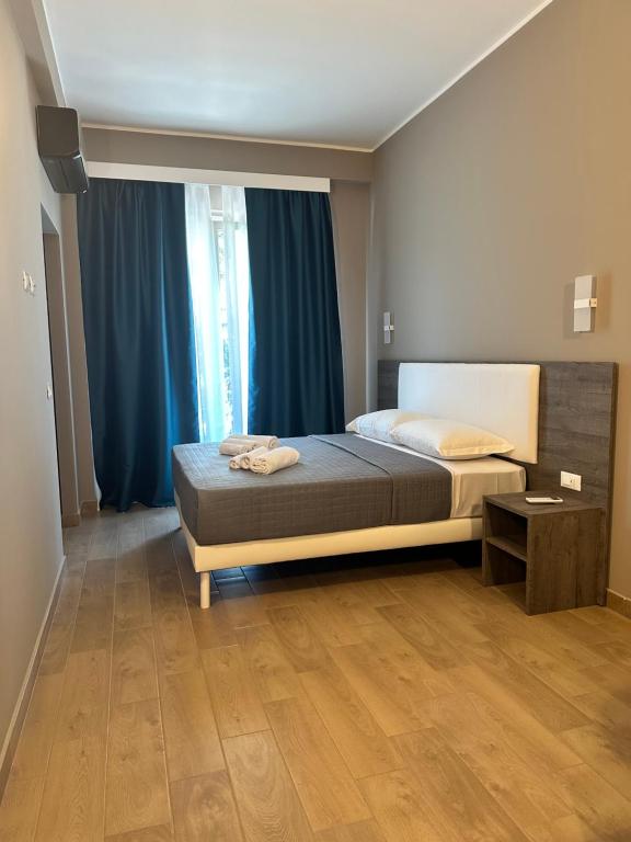 Postel nebo postele na pokoji v ubytování Sunset Guest House