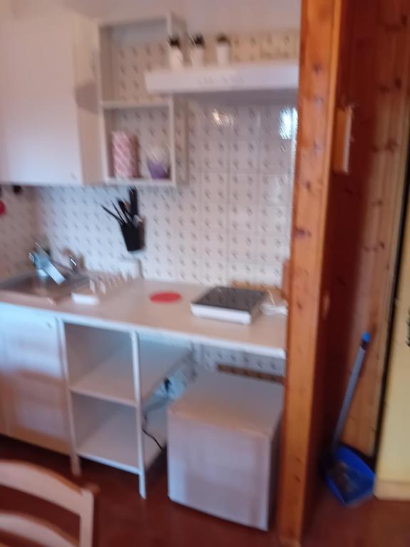 A kitchen or kitchenette at Monolocale campo d'altura