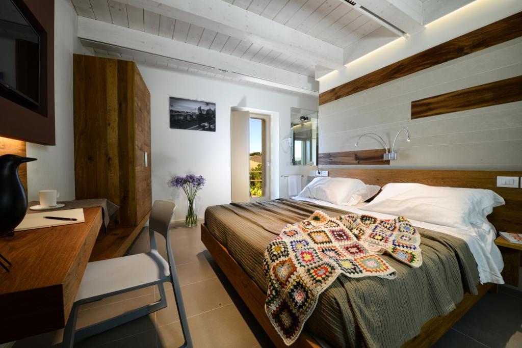 Кровать или кровати в номере Resort Il Gallo Senone