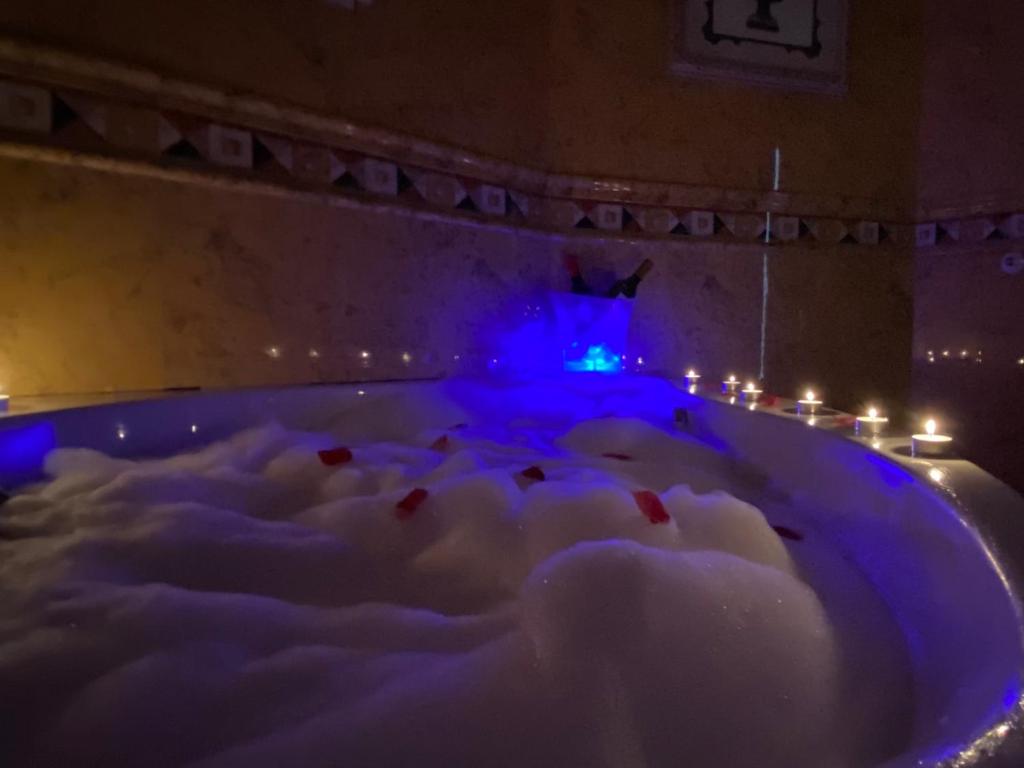 a bath tub filled with lots of snow and lights at Villa Ros in Murcia