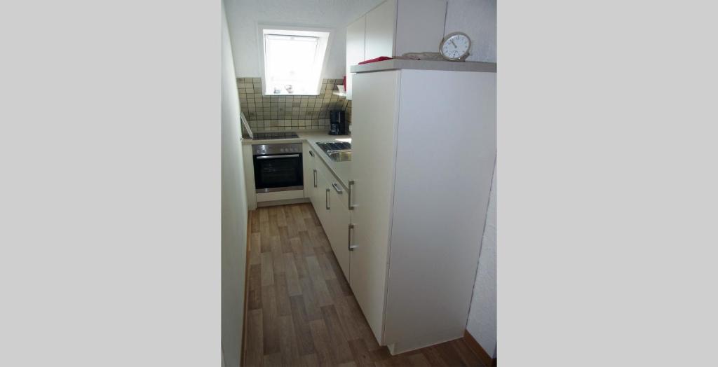 Kuchyň nebo kuchyňský kout v ubytování Apartment Peters