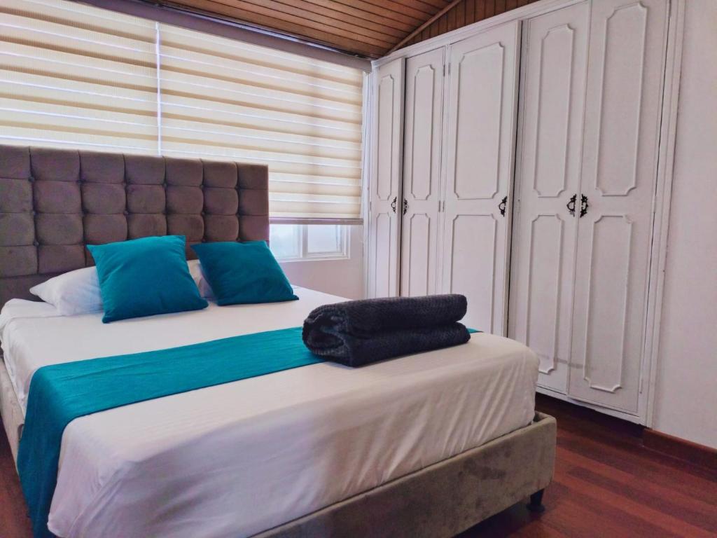 Postel nebo postele na pokoji v ubytování Hotel Batan-127