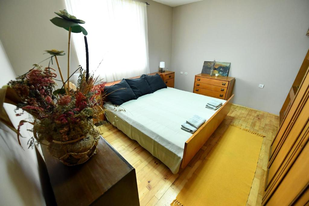 Cama o camas de una habitación en Apartmani SIMOVIĆ