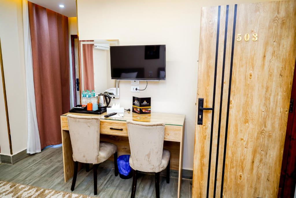 Kuchyň nebo kuchyňský kout v ubytování Pyramids Hotel