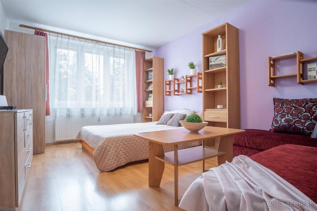 Postel nebo postele na pokoji v ubytování Ubytovanie apartman Pálenica