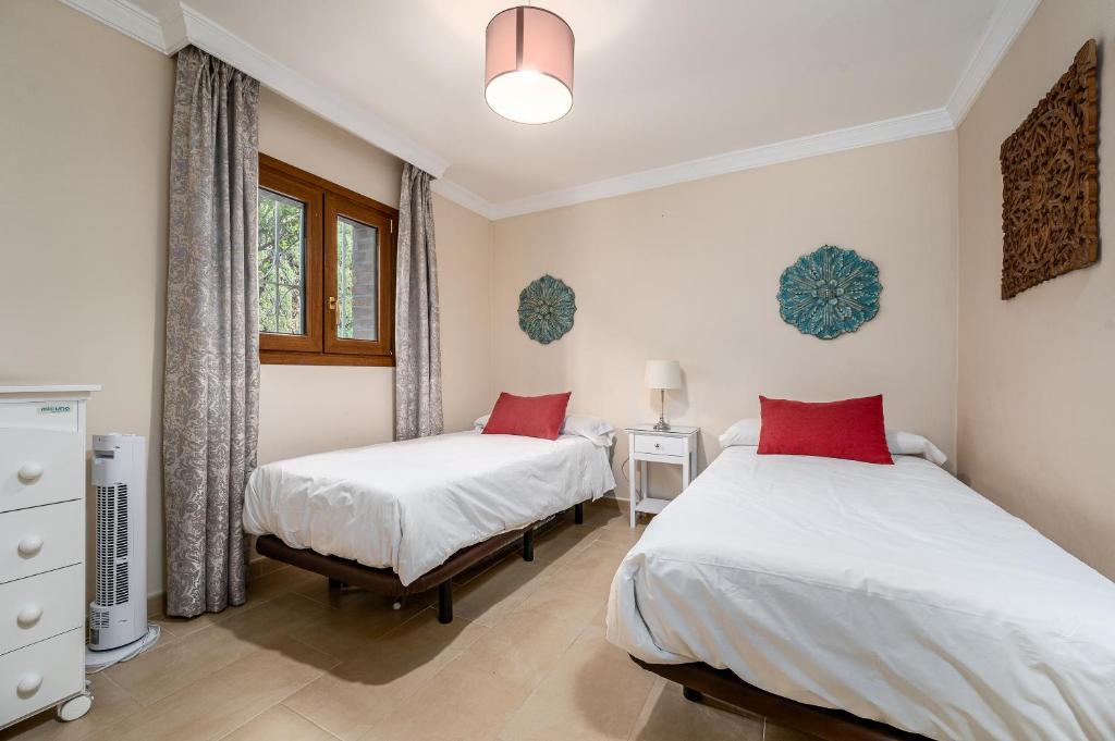 Postel nebo postele na pokoji v ubytování Villa mariposa