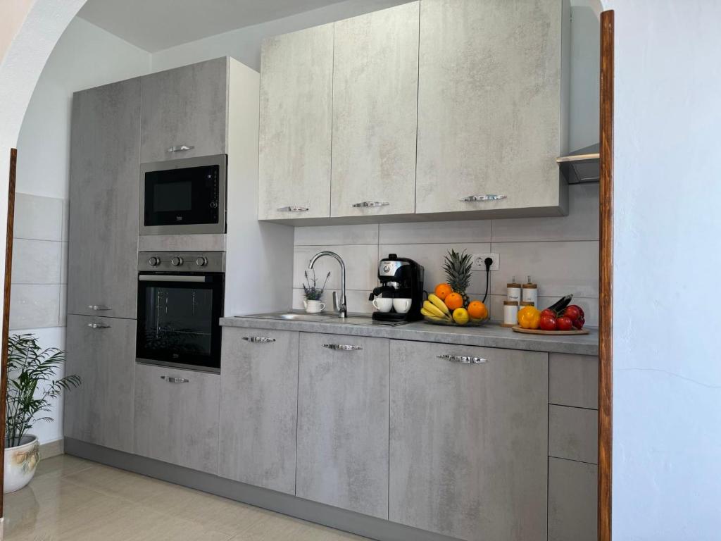 Kuchnia lub aneks kuchenny w obiekcie House Nada apartman