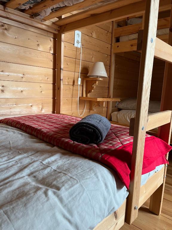 Postel nebo postele na pokoji v ubytování Chalet des Myrtilles - chalet cosy avec vue