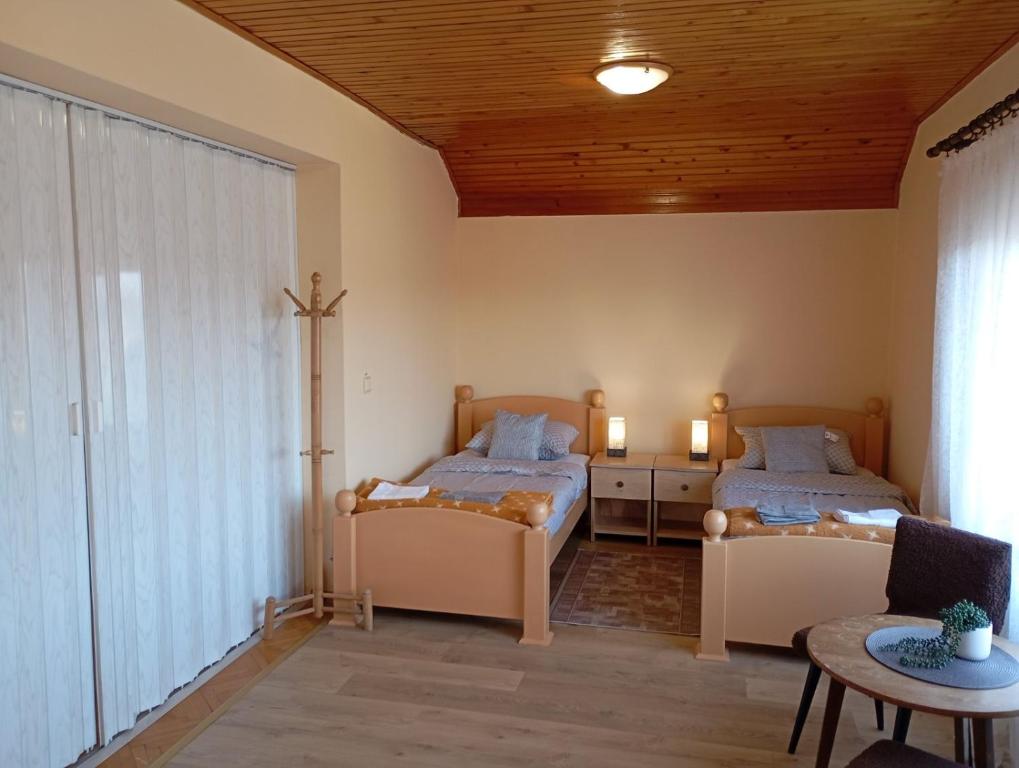 Postel nebo postele na pokoji v ubytování Apartman Sekulić