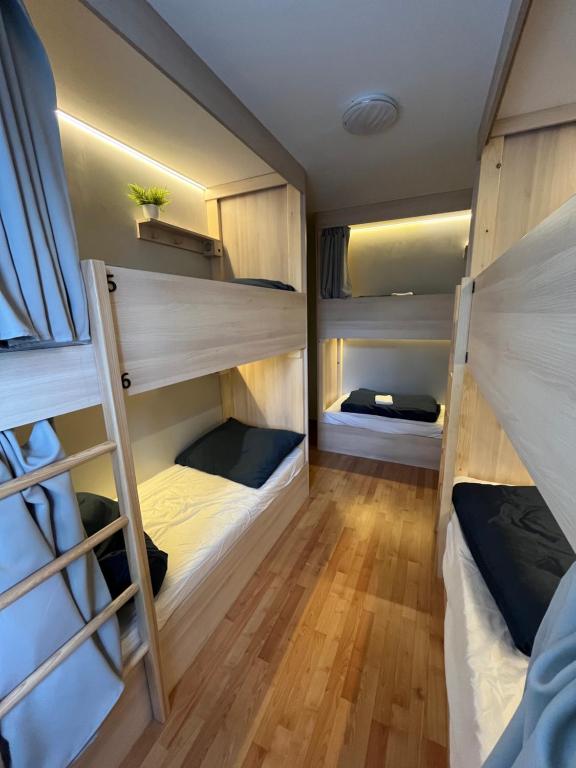 Voodi või voodid majutusasutuse Bad Stuben Hostel toas