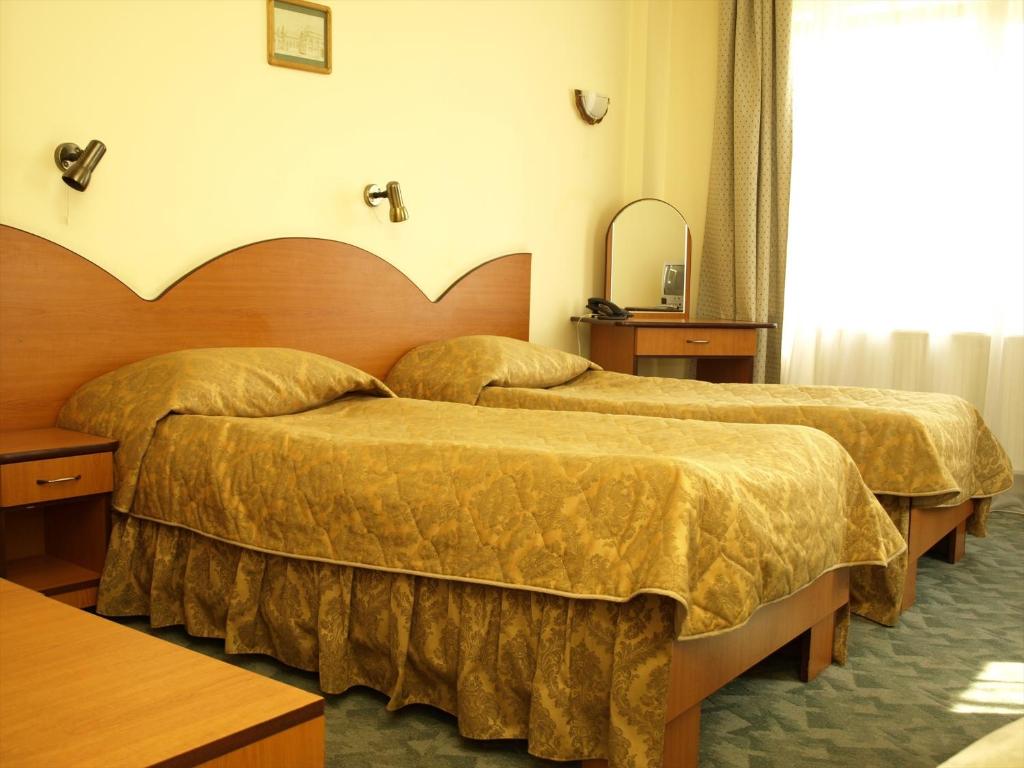 Postel nebo postele na pokoji v ubytování Hotel Everest