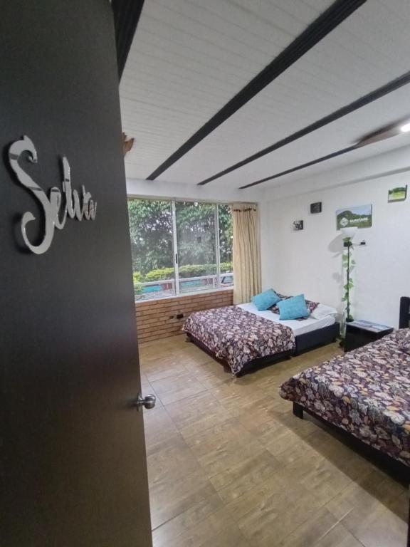 Alojamiento Rural Entre El llano y la selva - Sala Familiar Con Vista Al Jardín