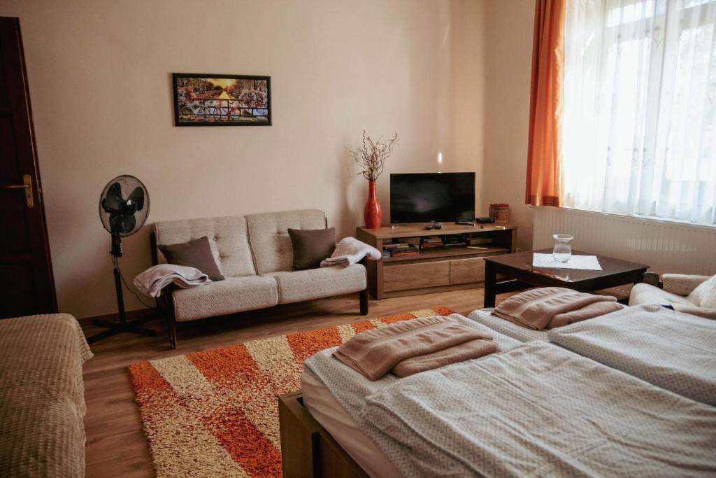 Posteľ alebo postele v izbe v ubytovaní Dobay Apartman Gyula