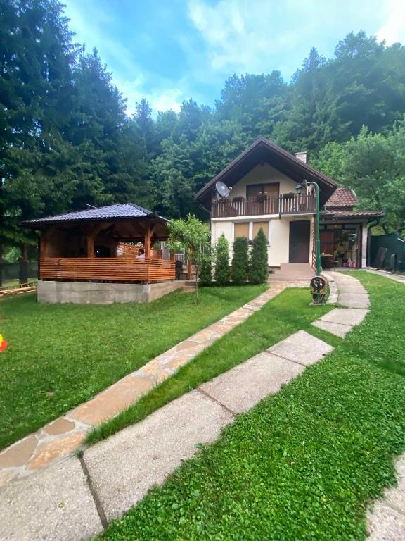 a house with a gazebo in a yard at Forest House between Sarajevo & Vlasic in Busovača
