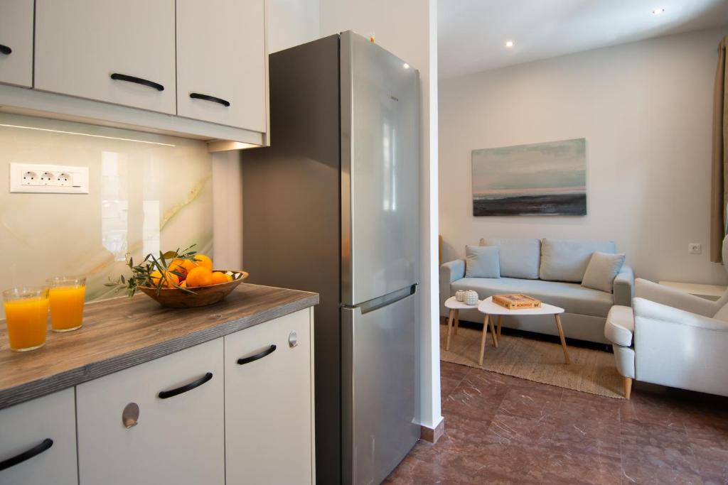 Kuchyň nebo kuchyňský kout v ubytování Golden Seashell Apartment