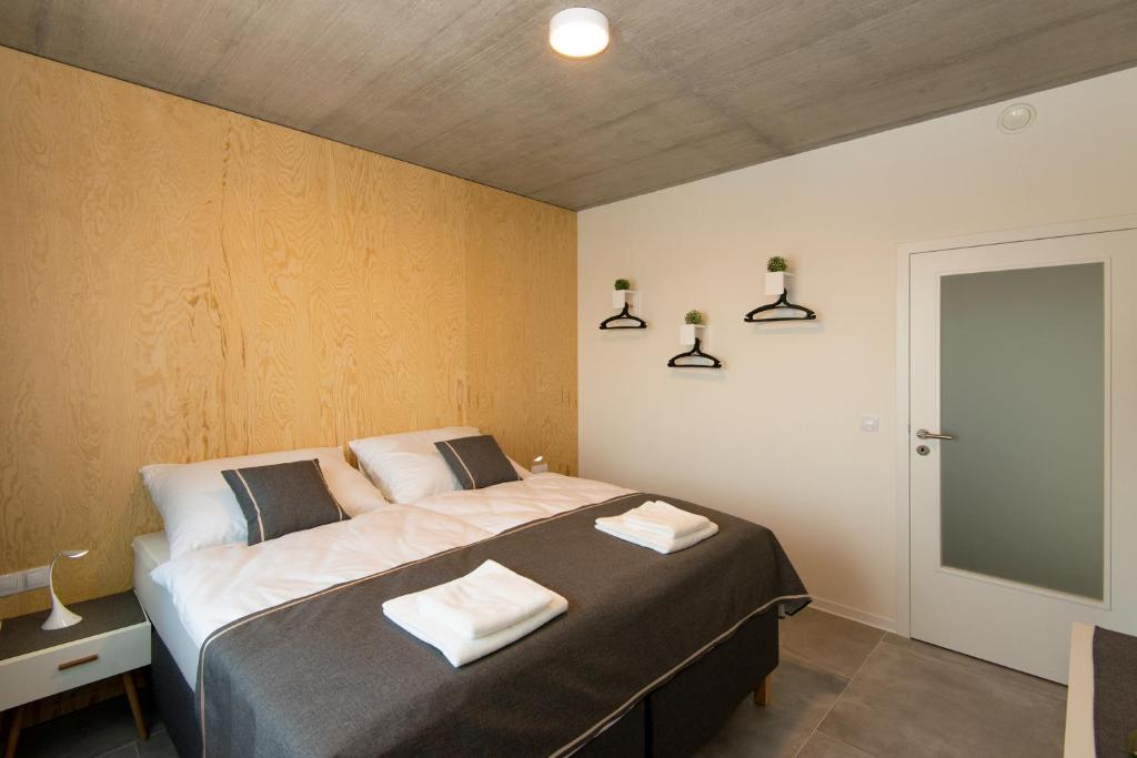 Postel nebo postele na pokoji v ubytování Residence Trafick