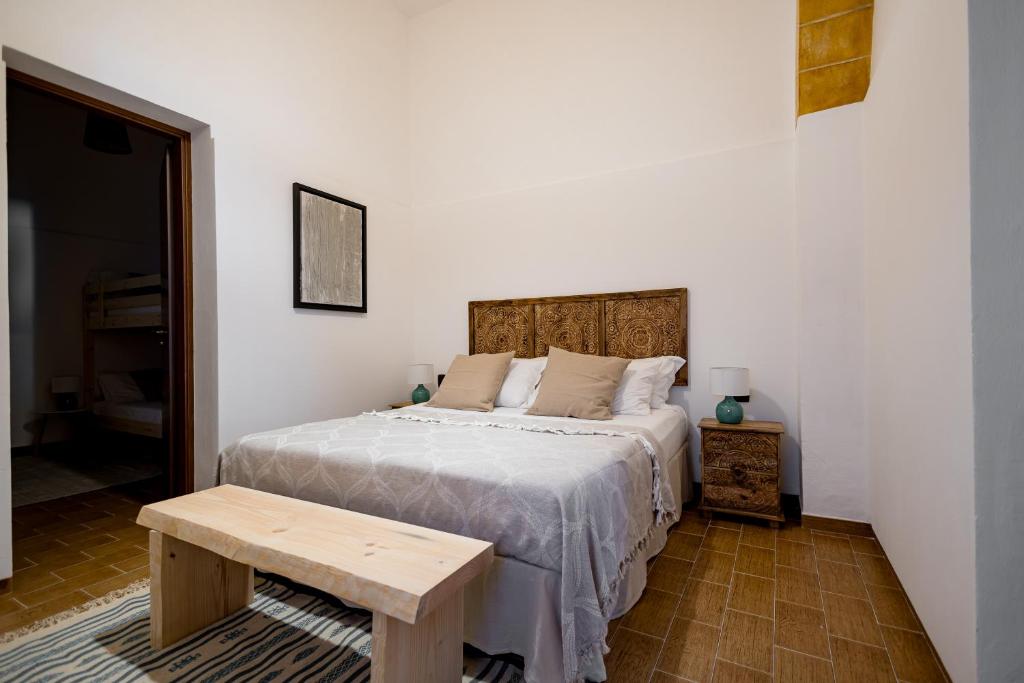 Letto o letti in una camera di Sciaraqa