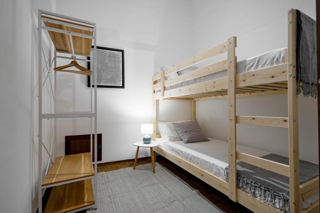Letto o letti in una camera di Sciaraqa