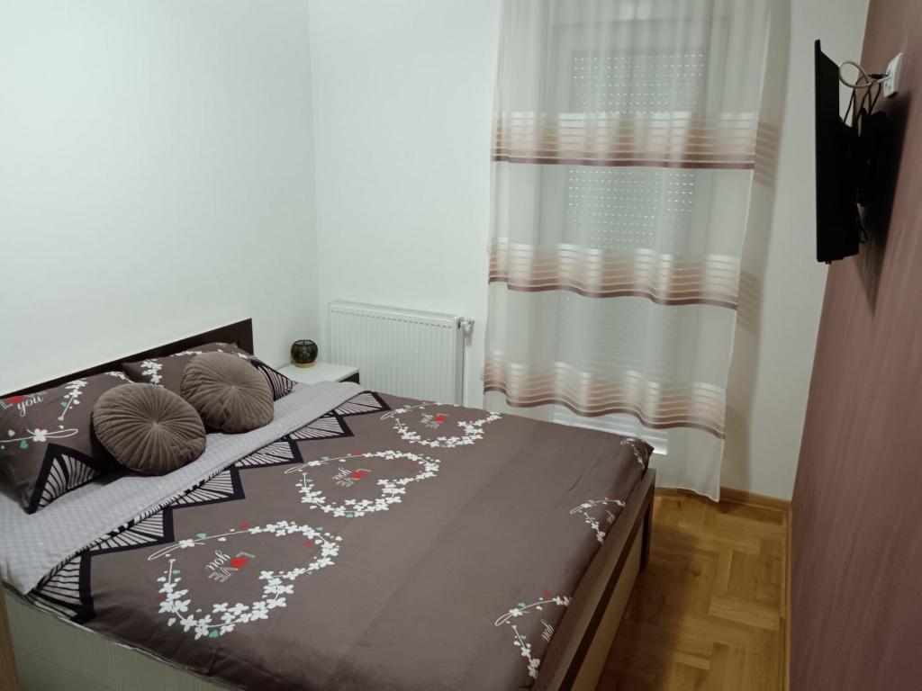 Postel nebo postele na pokoji v ubytování Apartman Jasna