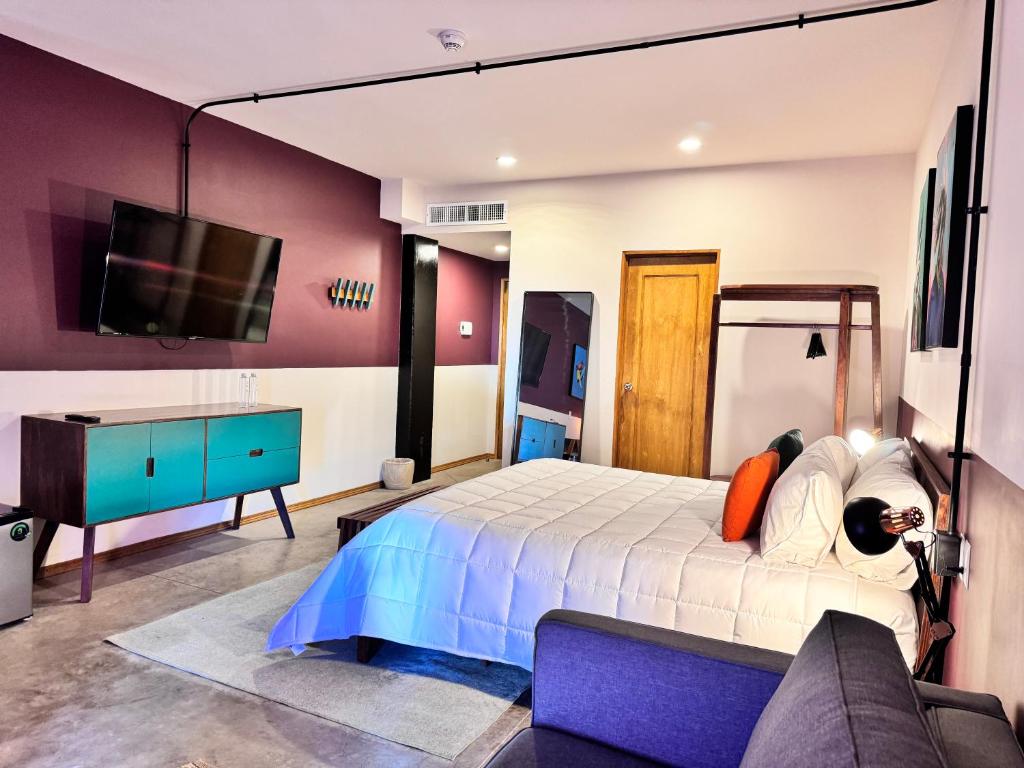Postel nebo postele na pokoji v ubytování Hotel Olá Chapultepec