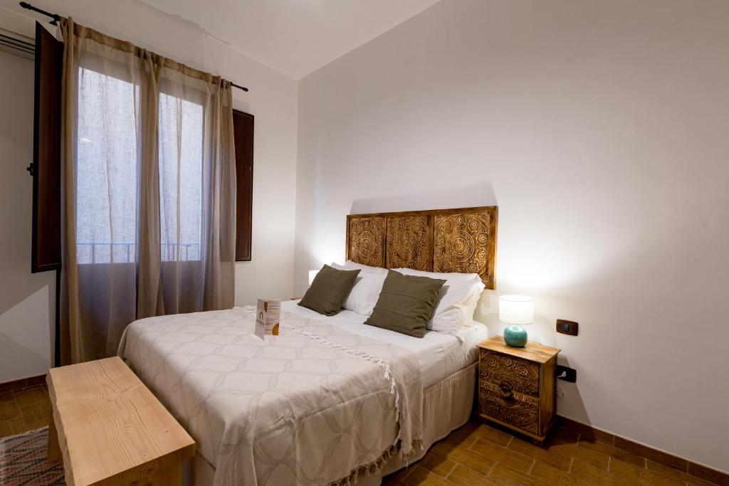 Letto o letti in una camera di Sciaraqa