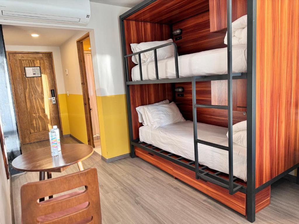 Postel nebo postele na pokoji v ubytování Hotel Olá Chapultepec