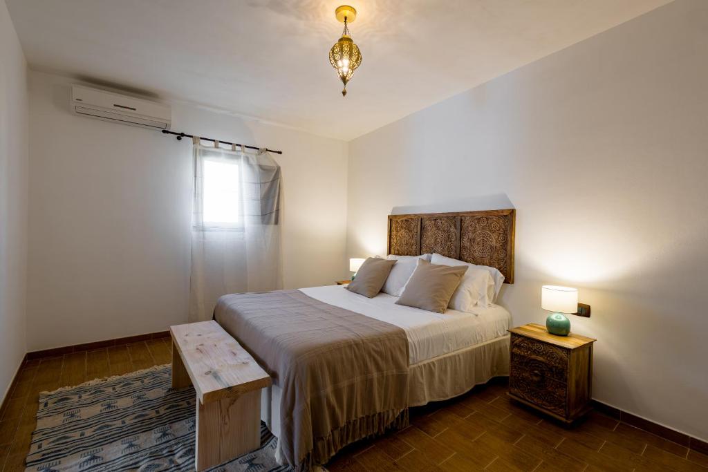 Letto o letti in una camera di Sciaraqa