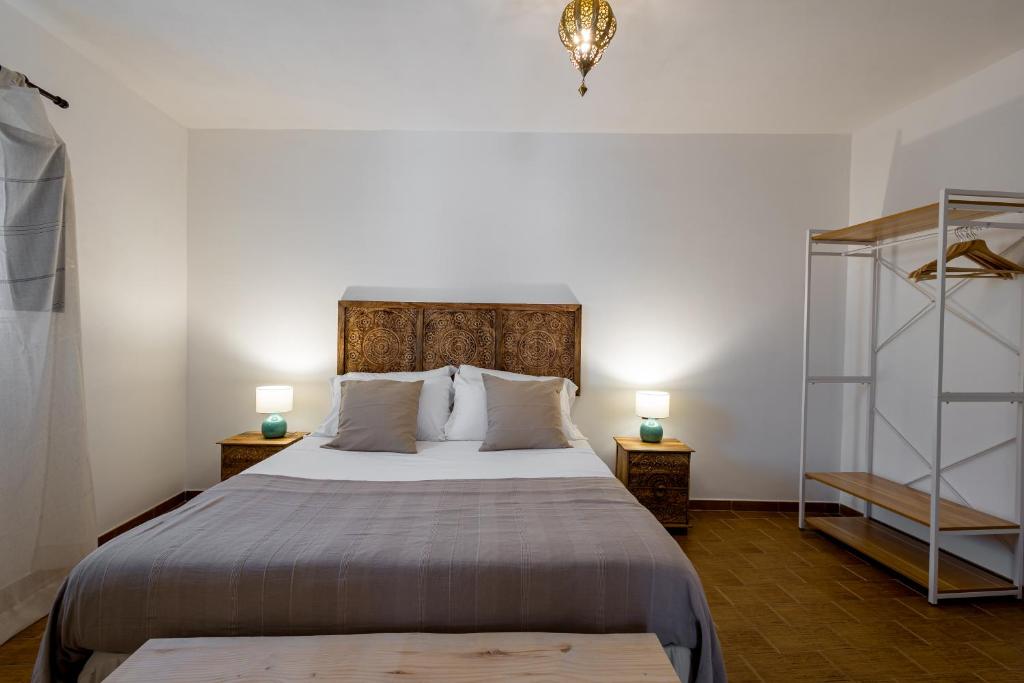 Letto o letti in una camera di Sciaraqa