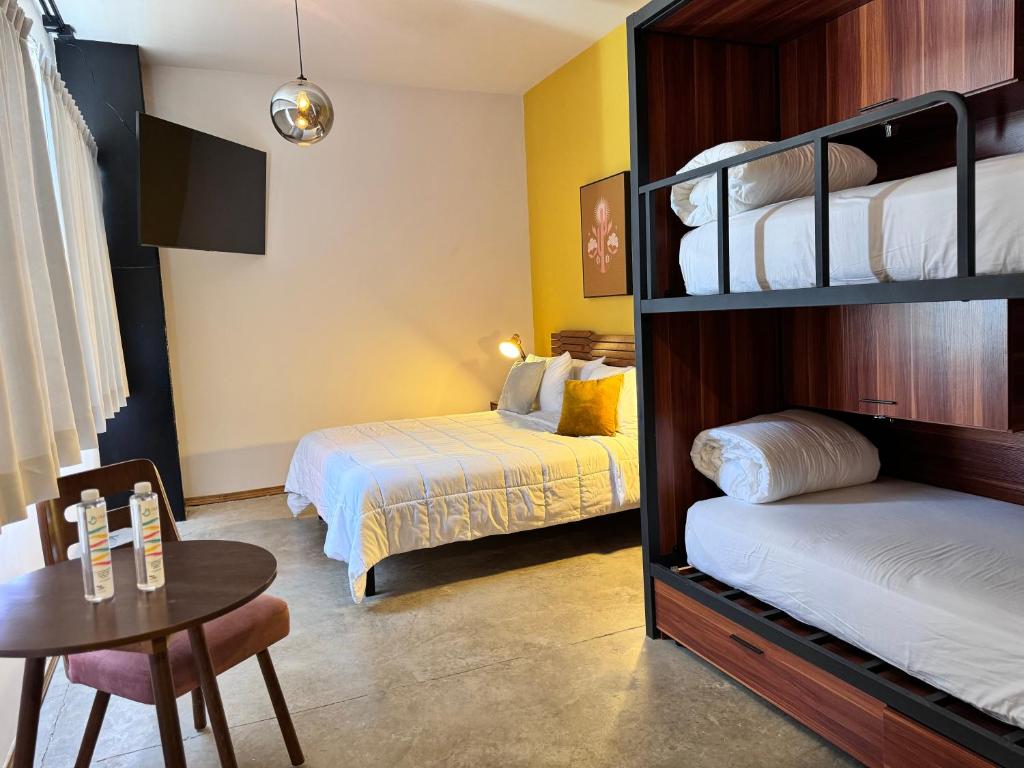 Postel nebo postele na pokoji v ubytování Hotel Olá Chapultepec