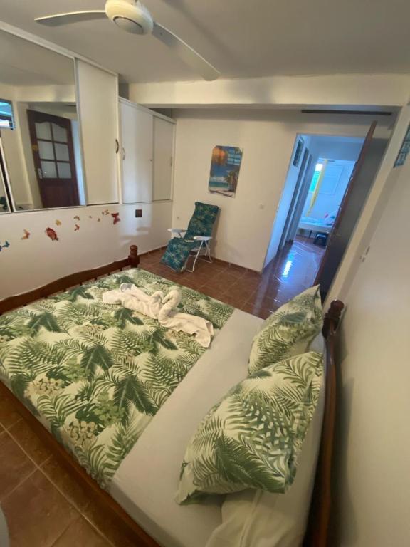 Postel nebo postele na pokoji v ubytování Un été sans fin