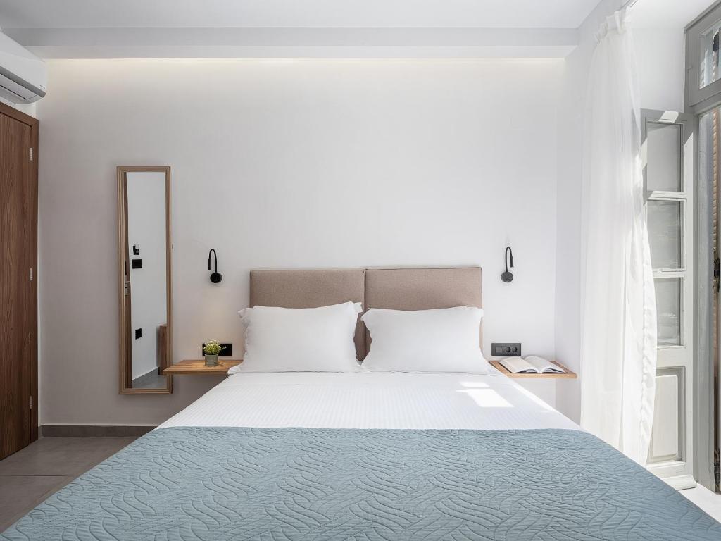 Postel nebo postele na pokoji v ubytování Porto Vecchio
