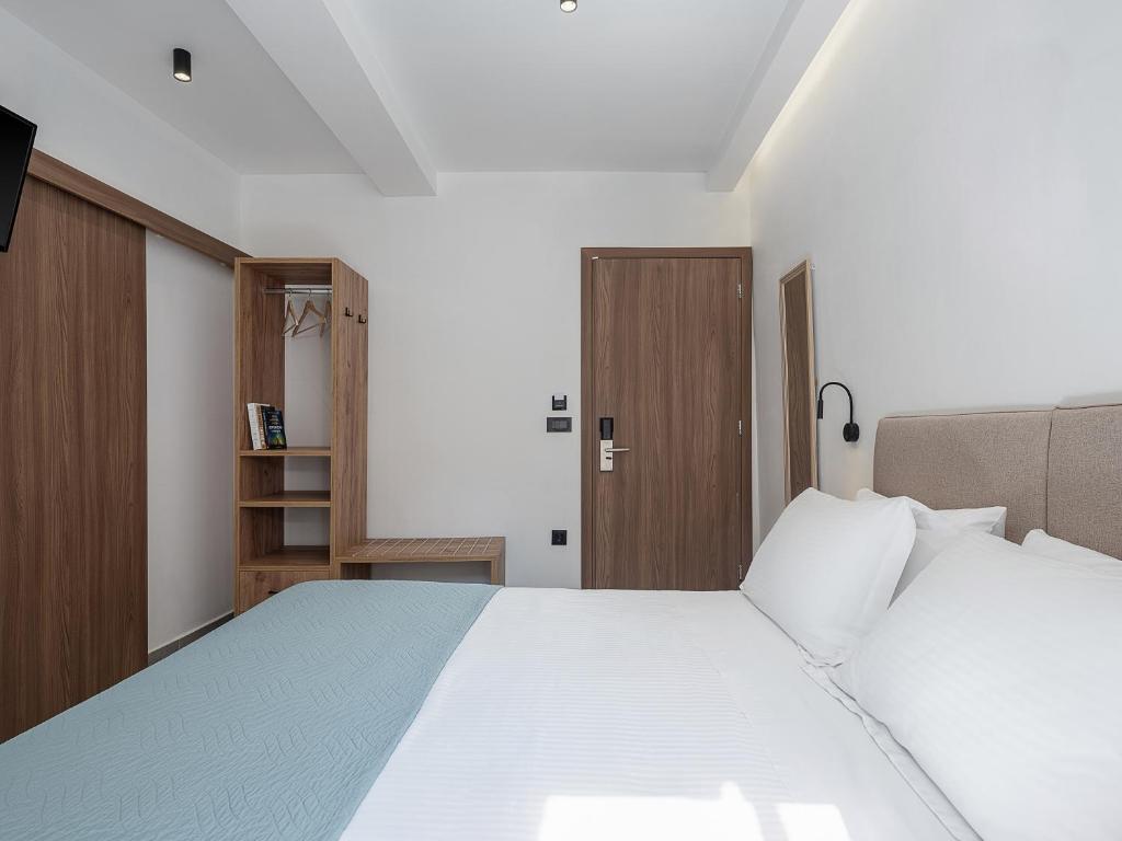 Postel nebo postele na pokoji v ubytování Porto Vecchio