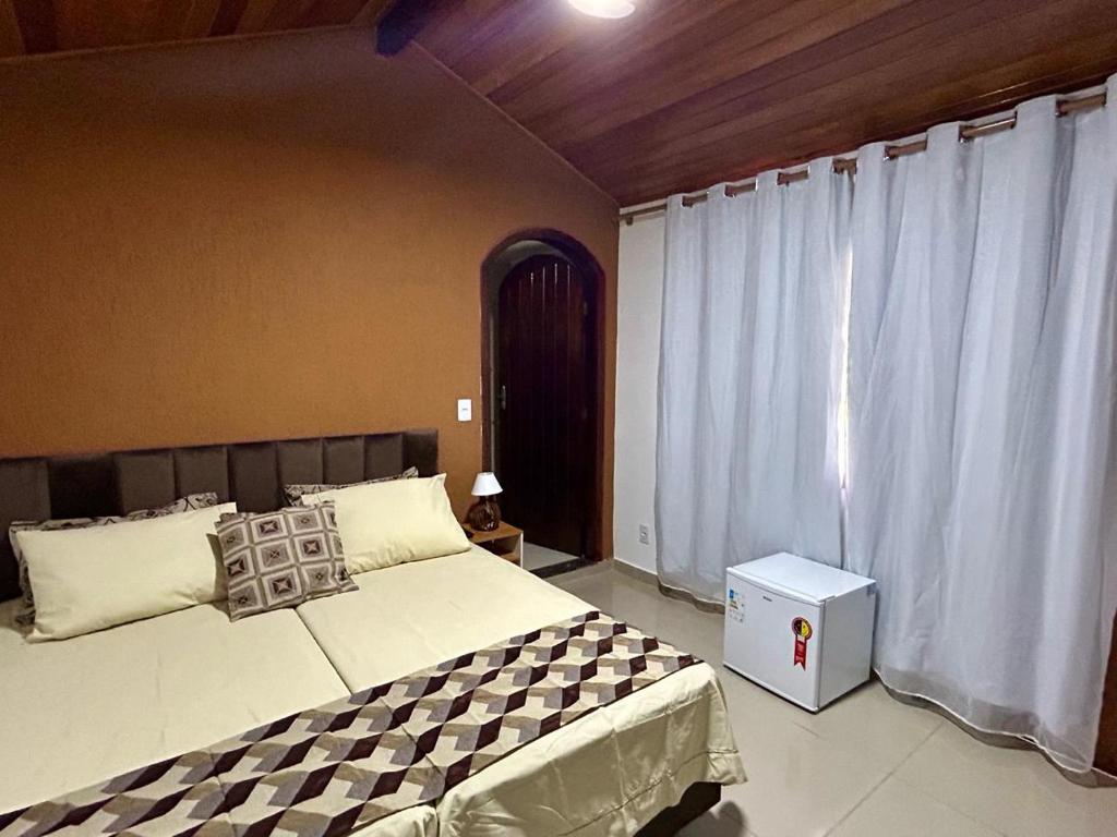 Postel nebo postele na pokoji v ubytování Sitio esperança