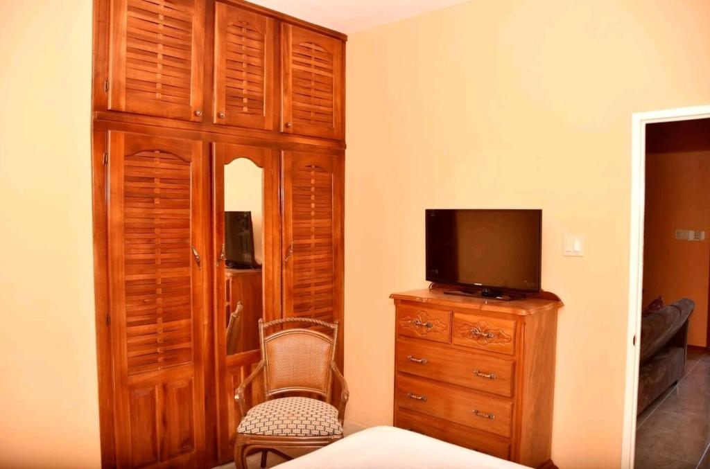 TV a/nebo společenská místnost v ubytování LW Guesthouse