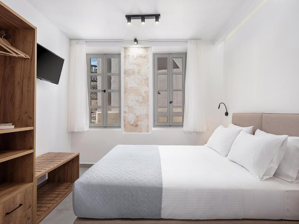 Postel nebo postele na pokoji v ubytování Porto Vecchio