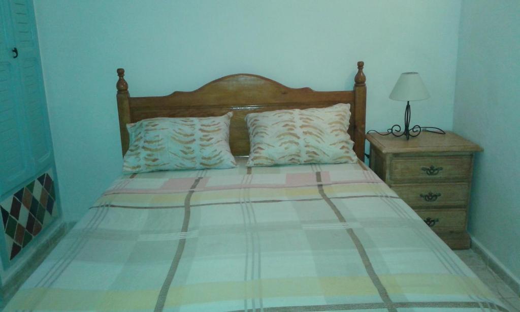Postel nebo postele na pokoji v ubytování Appart Hôtel La Planque