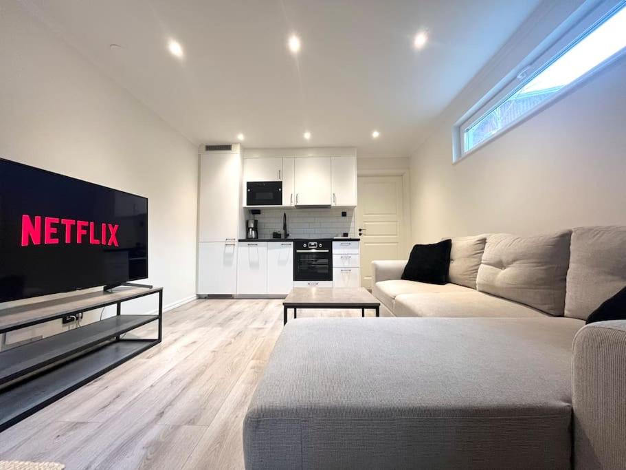 A television and/or entertainment centre at Elegant house Stockholm