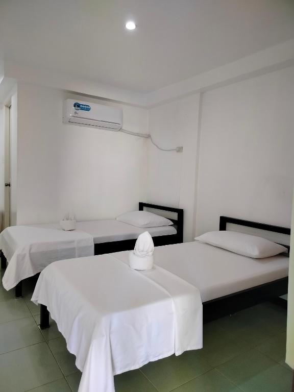 Postel nebo postele na pokoji v ubytování Lang2 place