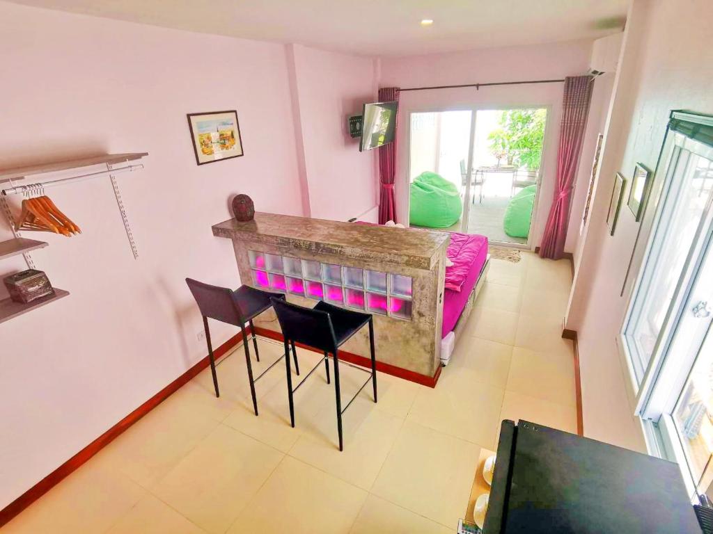 Posezení v ubytování Mango Tree Villa