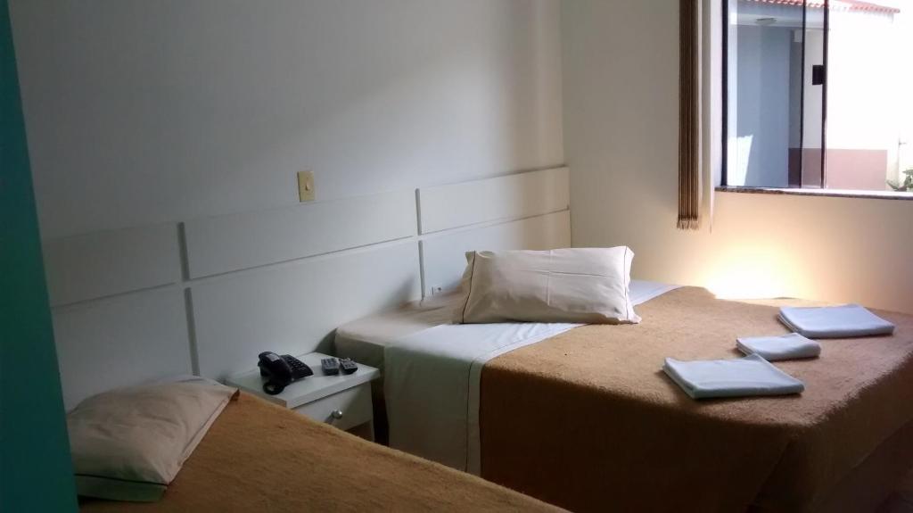 Postel nebo postele na pokoji v ubytování Hotel Manayara