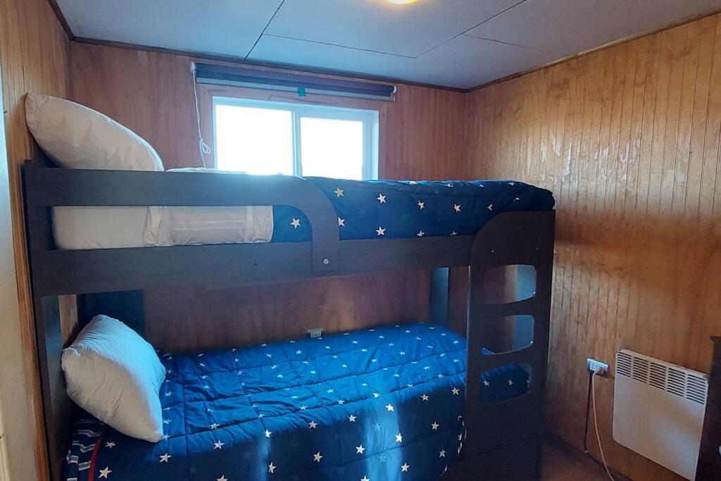 Palanda nebo palandy na pokoji v ubytování Cabaña Zorro Chilote
