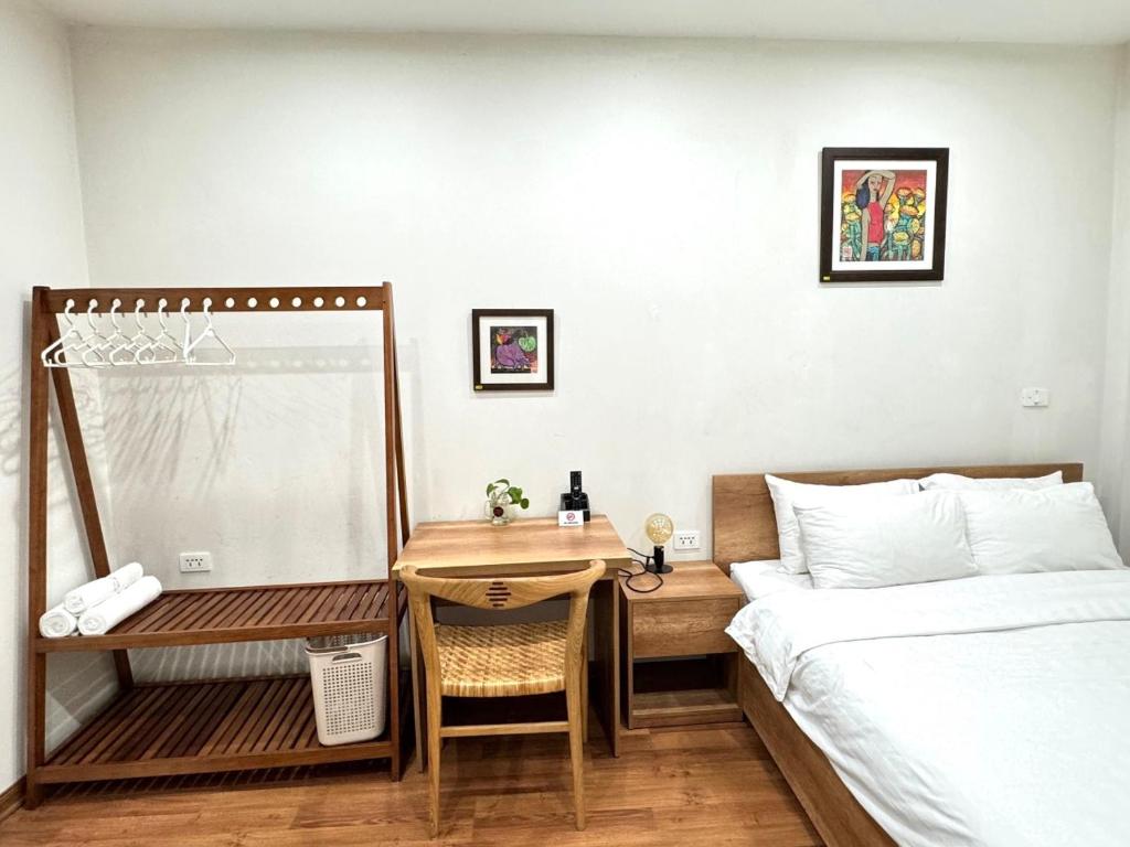 Postel nebo postele na pokoji v ubytování Picturesque Hanoi Homestay