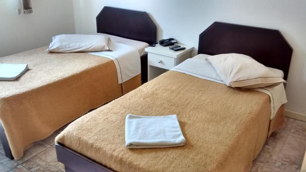 Postel nebo postele na pokoji v ubytování Hotel Manayara