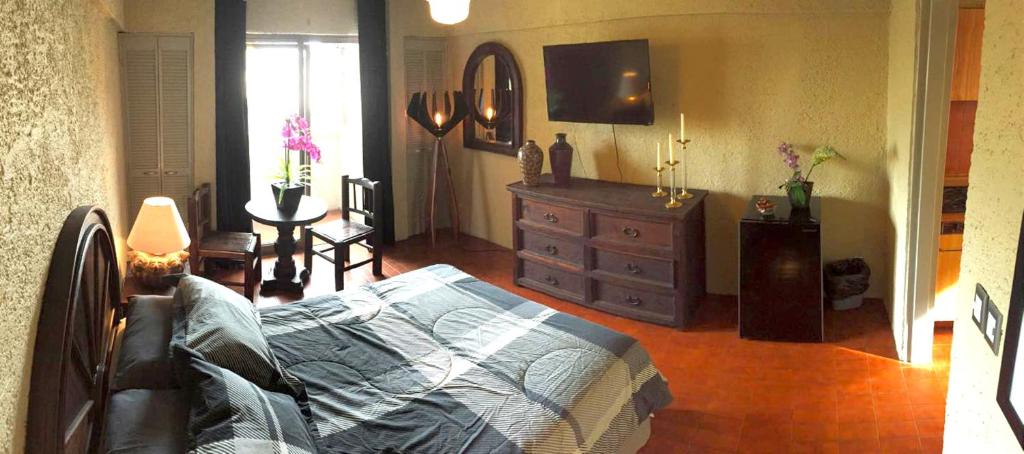 Postel nebo postele na pokoji v ubytování Aurora Suites