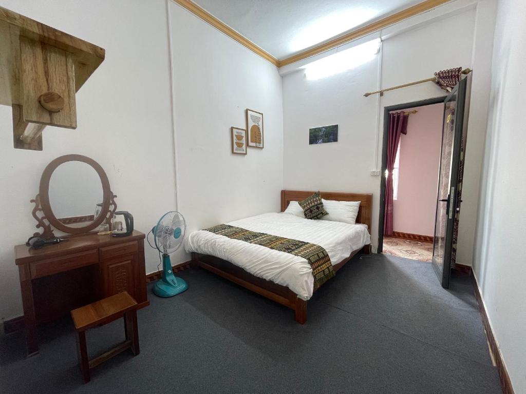Postel nebo postele na pokoji v ubytování NiNi Homestay Sapa