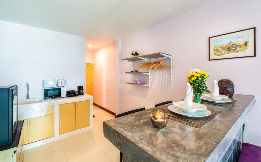Kuchyň nebo kuchyňský kout v ubytování Mango Tree Villa