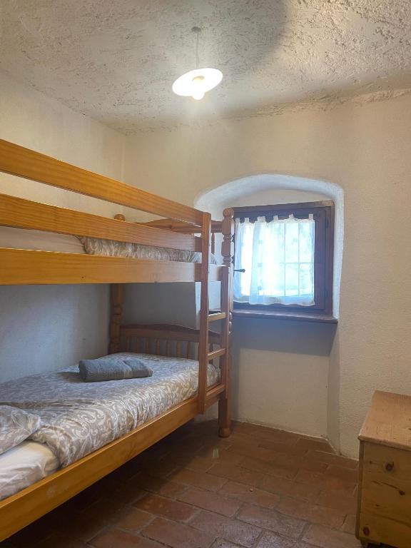 Postel nebo postele na pokoji v ubytování Maso Mandrea